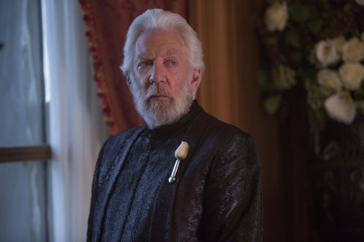 A still image of Donald Sutherland as President Snow in The Hunger Games saga.