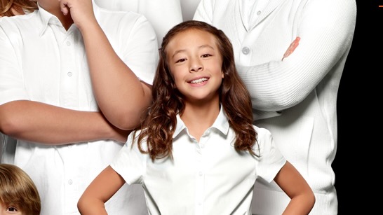 A still image of Aubrey Anderson-Emmons as Lily Tucker-Pritchett in Modern Family.