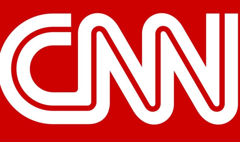 A white CNN logo against a red background.