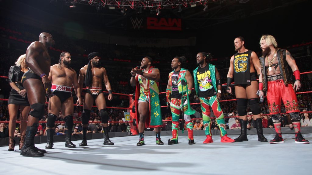 A still image of the WWE Monday Night Raw cast in the ring.