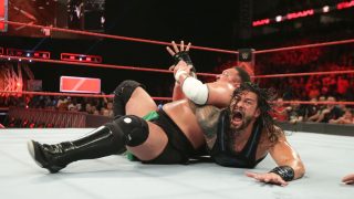 A still image from WWE Monday Night Raw featuring two wrestlers in the ring.