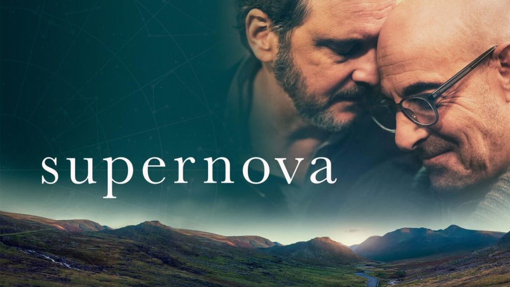 Title art for Supernova featuring Colin Firth and Stanley Tucci projected over a mountainous terrain.