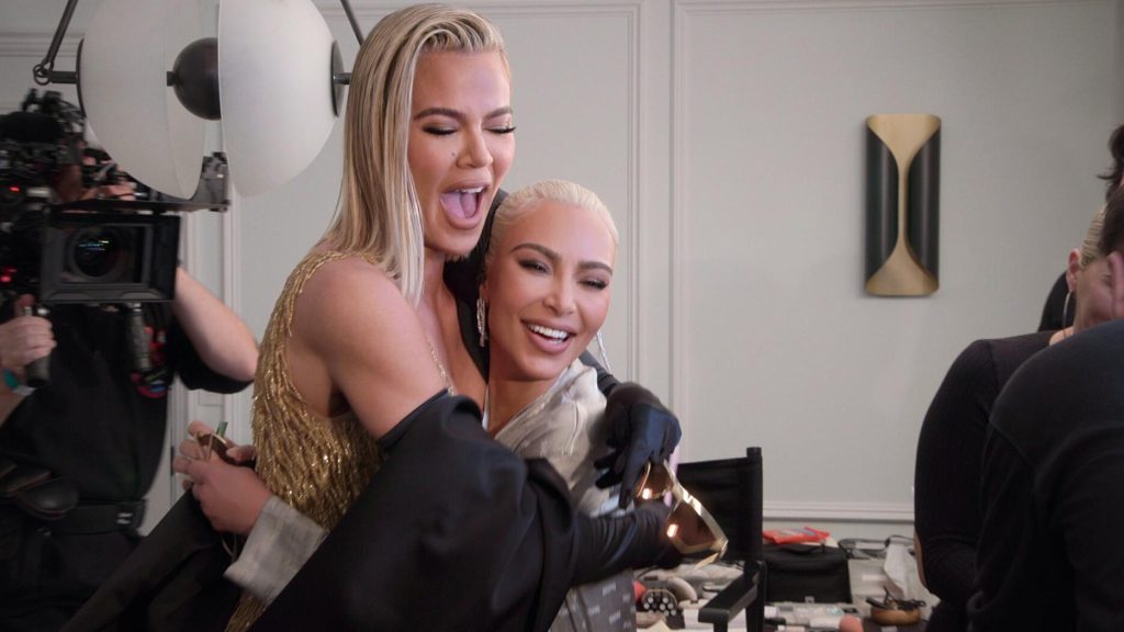 A still image from Season 2 of The Kardashians, with Khloé and Kim Kardashian getting ready for the Met Gala.